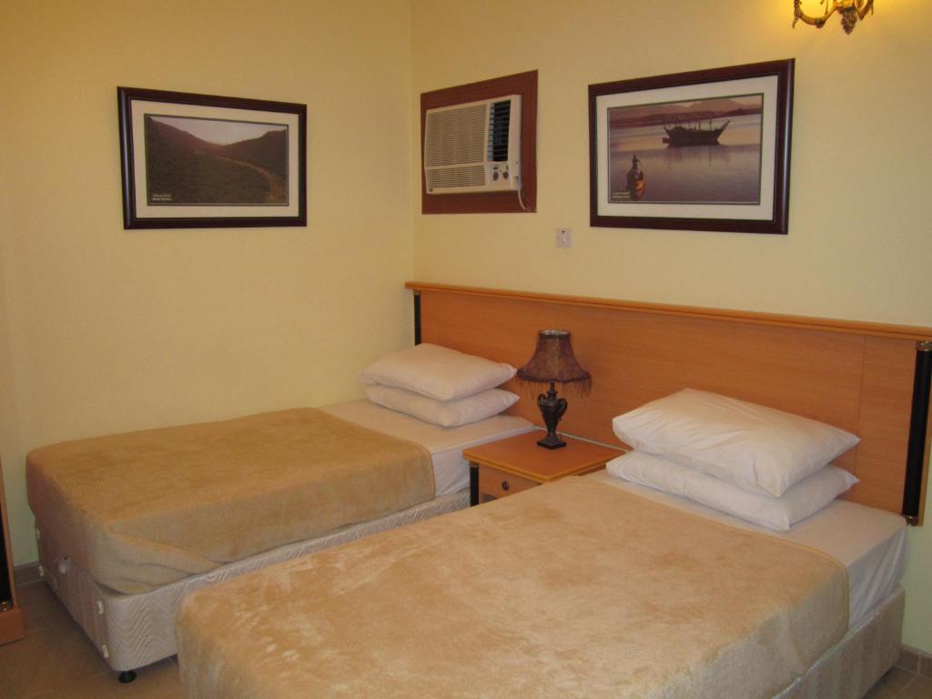 Muscat International Hotel Oda fotoğraf